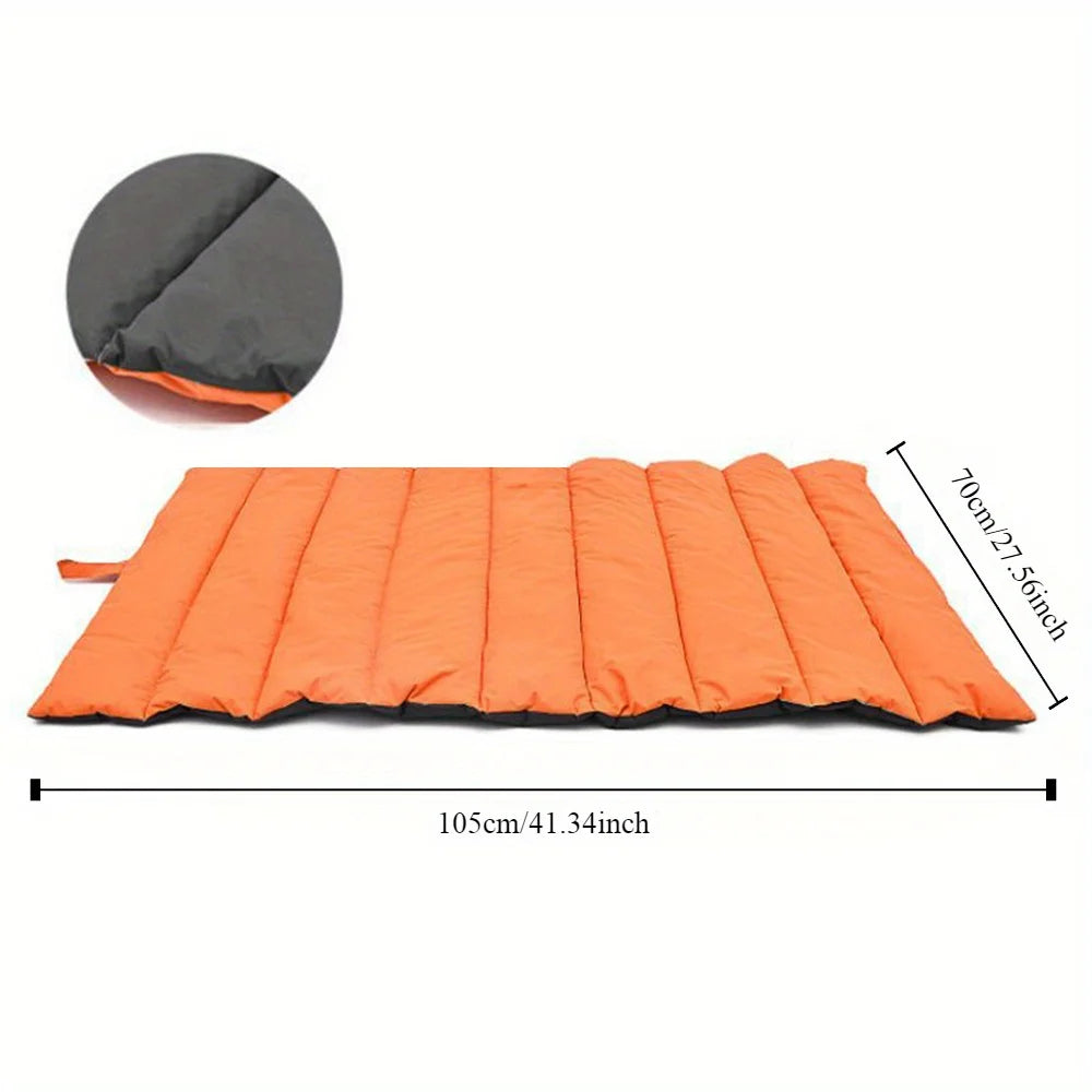 An orange inflatable sleeping pad shown on a white background with dimension lines indicating 105 cm by 70 cm, plus a circular inset showing the dark gray inner side.